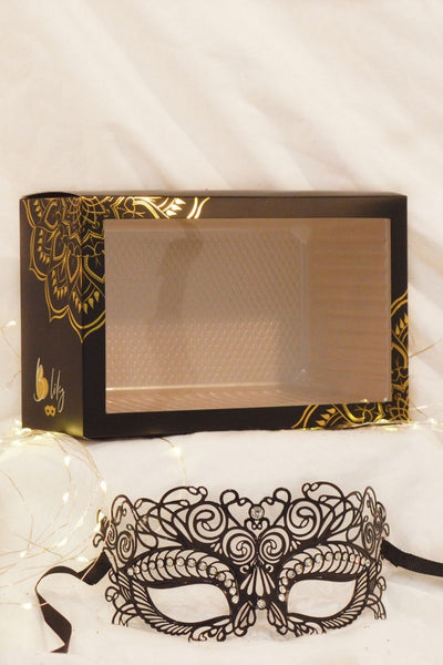 Venezianische Maske mit eingerollten